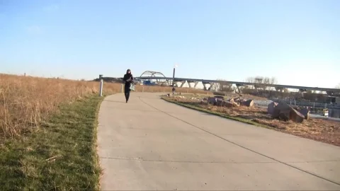 Slender Asian redhead in casual clothes outdoors and indoors