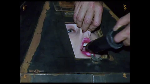 Blonde woman gagged and tied up outdoor