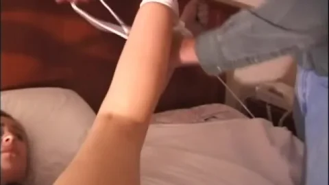 Blonde in yellow dress tied up, gagged, and smothered on bed