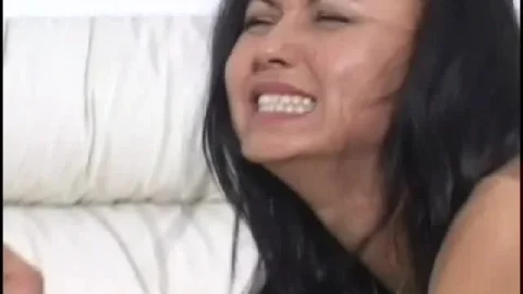 Asian Girl Fucks Herself With Strap-On