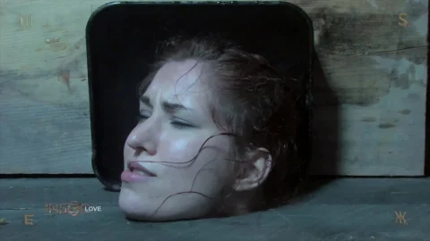 Redhead in dungeon gets rough with man, chained and cuffed