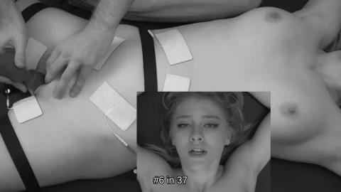 Blonde with arm tattoo gets electrostim on her small tits