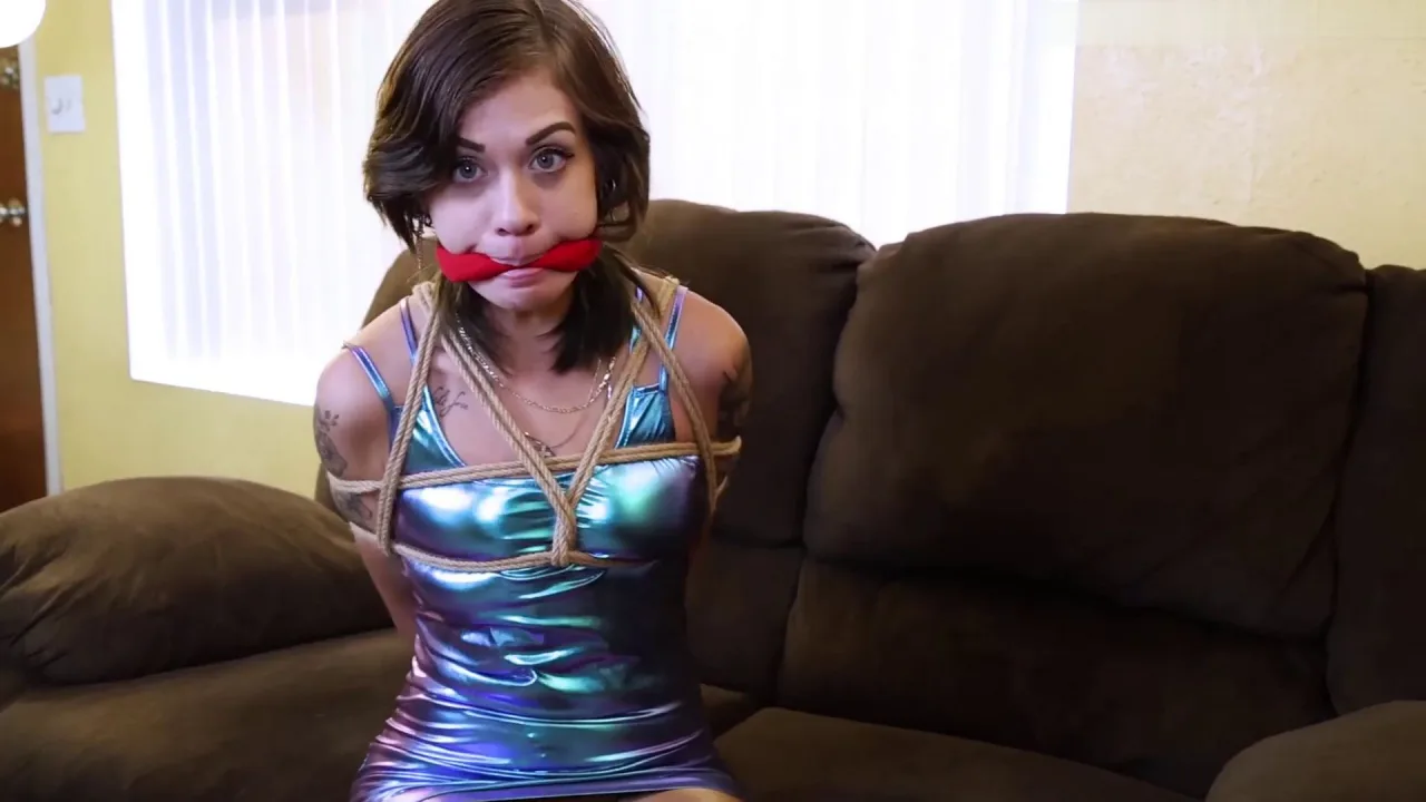 Lil Tokyo must to fake a robbery in the office to cover up she spent the company s payroll in a casino that involves her being tied and gagged